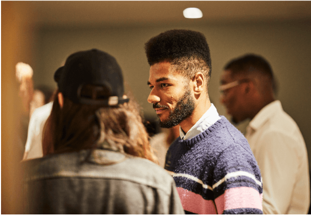 men in good mood talking with friends during the party