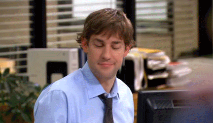 Jim Halpert and Pam Beesly high-fiving in The Office (US Version)